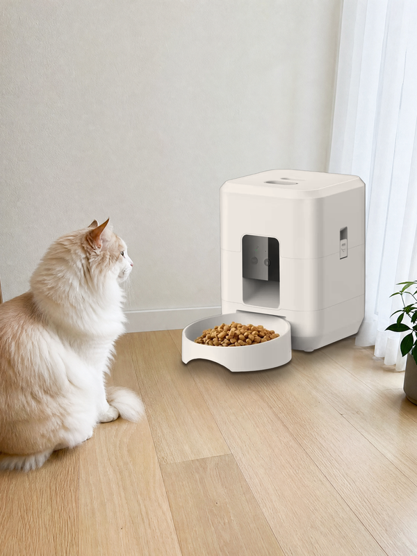 Pet beside a Cloud White PawPort™ Wi-Fi Feeder at home